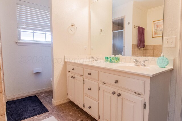 8201 Prosper Dr, Amarillo, TX 79119 - bathroom featuring ornamental molding, a stall shower, vanity, toilet, and tile patterned floors