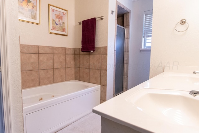 8201 Prosper Dr, Amarillo, TX 79119 - bathroom featuring a sink, a tub with jets, and a shower with shower door