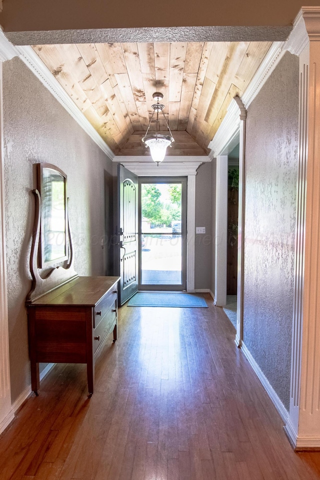 8201 Prosper Dr, Amarillo, TX 79119 - doorway to outside featuring wooden ceiling, wood-type flooring, vaulted ceiling, ornamental molding, and baseboards