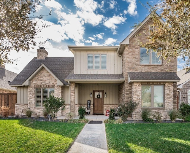 craftsman house featuring a front lawn