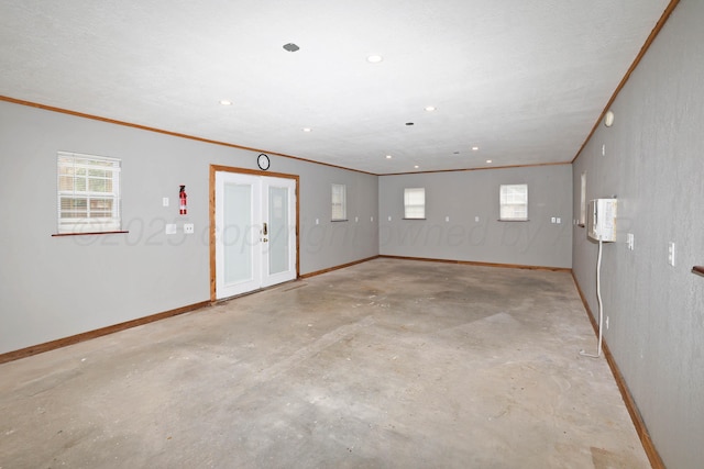 7426 Jameson Dr, Amarillo, TX 79121 - empty room with unfinished concrete floors, crown molding, and recessed lighting