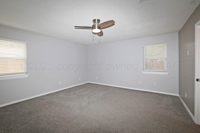 7426 Jameson Dr, Amarillo, TX 79121 - empty room with a ceiling fan, a textured ceiling, and dark carpet