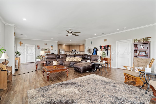 4687 E Fm 1151, Amarillo, TX 79118 - living area featuring recessed lighting, light wood finished floors, ceiling fan, and crown molding