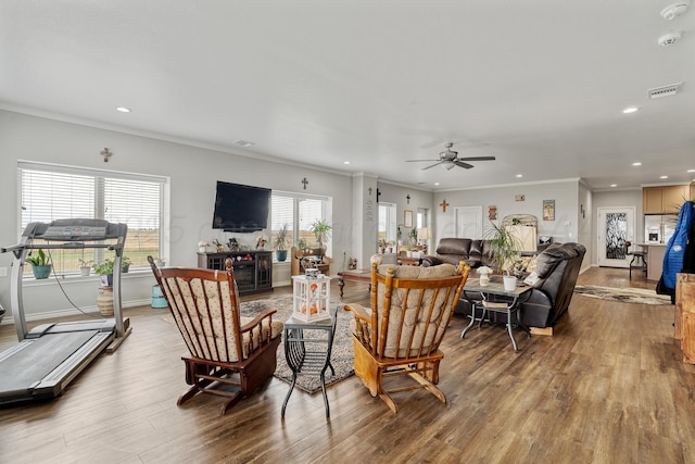 4687 E Fm 1151, Amarillo, TX 79118 - living area with recessed lighting, wood finished floors, a ceiling fan, and ornamental molding