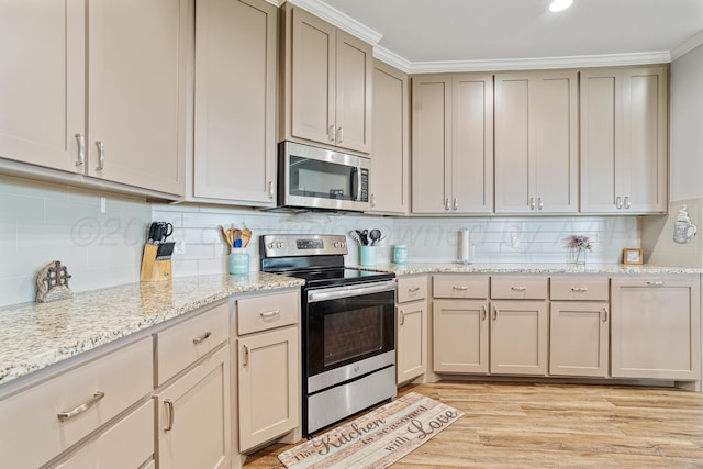 4687 E Fm 1151, Amarillo, TX 79118 - kitchen featuring stainless steel appliances, backsplash, light wood-style flooring, light stone countertops, and ornamental molding