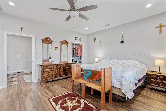 4687 E Fm 1151, Amarillo, TX 79118 - bedroom with wood finished floors, recessed lighting, a spacious closet, a closet, and a ceiling fan