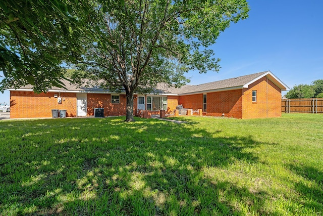 1604 Country Ln, Panhandle, TX 79068 - rear view of house featuring brick siding