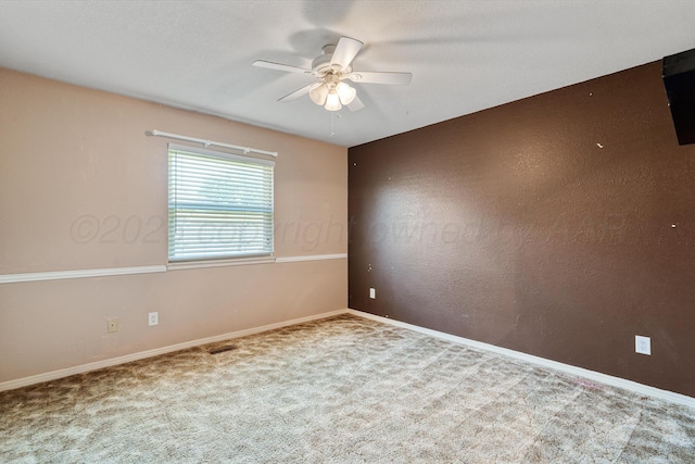 1604 Country Ln, Panhandle, TX 79068 - carpeted empty room with a ceiling fan and baseboards