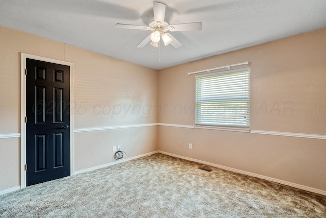 1604 Country Ln, Panhandle, TX 79068 - empty room with a ceiling fan and carpet flooring