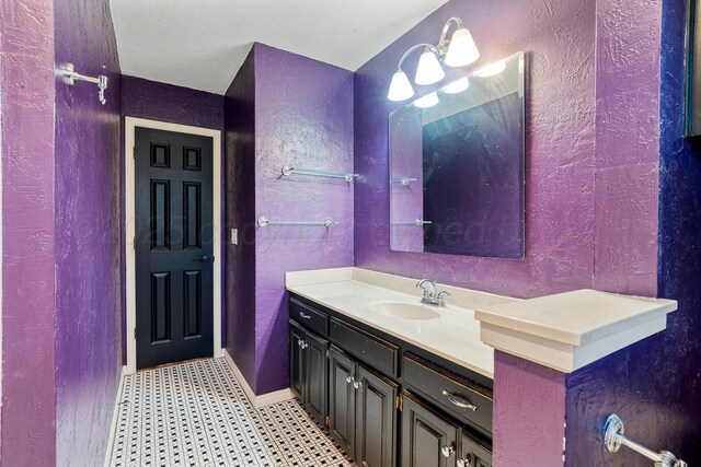 1604 Country Ln, Panhandle, TX 79068 - bathroom with vanity and a textured wall