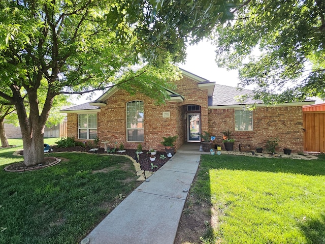 7906 Saint Louis Dr, Amarillo, TX 79118 - view of front of property featuring brick siding and a shingled roof
