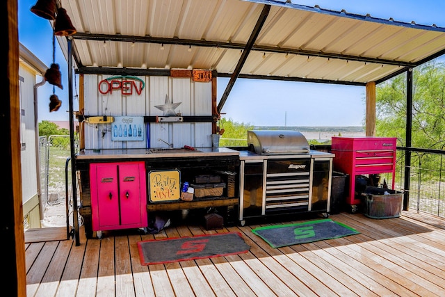 wooden terrace featuring a bar