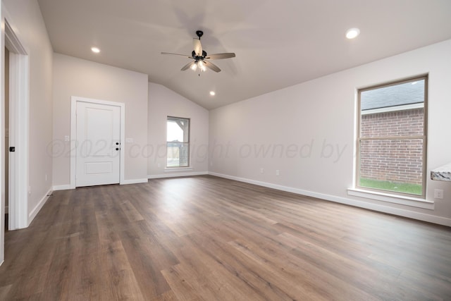 3100 Settler Ave, Amarillo, TX 79124 - empty room with a ceiling fan, vaulted ceiling, dark wood-type flooring, and recessed lighting