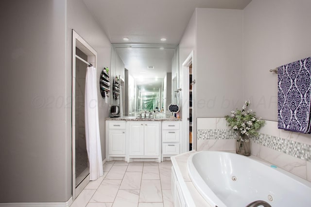 9191 E Strawberry Fields Dr, Canyon, TX 79119 - bathroom with a stall shower, vanity, marble look tile flooring, a tub with jets, and recessed lighting
