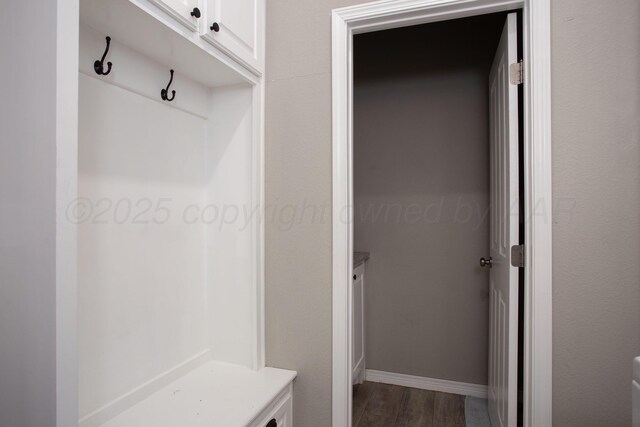 9191 E Strawberry Fields Dr, Canyon, TX 79119 - mudroom with dark wood-style flooring and baseboards