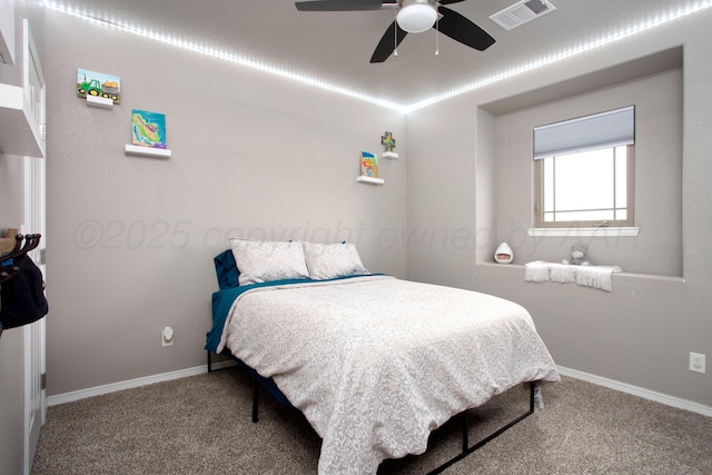 9191 E Strawberry Fields Dr, Canyon, TX 79119 - carpeted bedroom with baseboards and ceiling fan