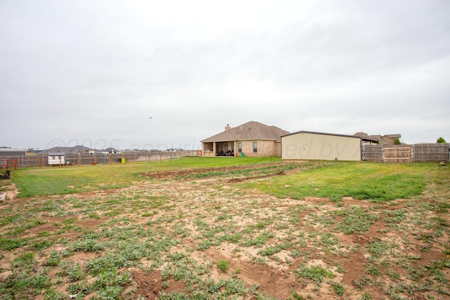 9191 E Strawberry Fields Dr, Canyon, TX 79119 - view of yard featuring an outbuilding and an outdoor structure