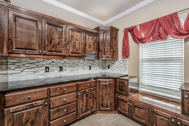 7110 Bennett St, Amarillo, TX 79119 - kitchen featuring dark brown cabinetry, ornamental molding, and decorative backsplash