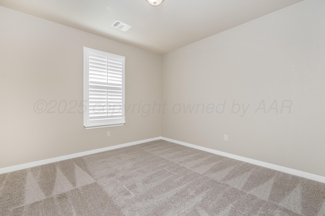 7110 Bennett St, Amarillo, TX 79119 - carpeted empty room featuring baseboards