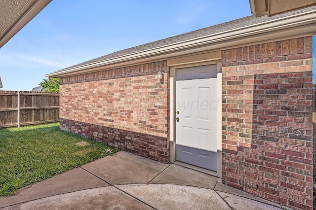 7110 Bennett St, Amarillo, TX 79119 - property entrance featuring brick siding