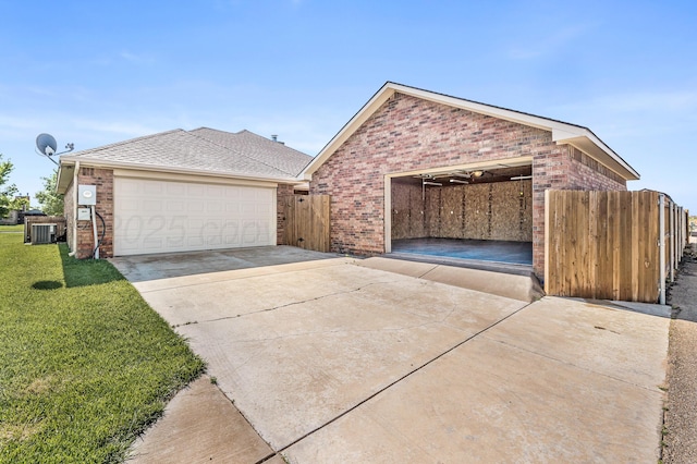 7110 Bennett St, Amarillo, TX 79119 - view of front of house with brick siding and a detached garage