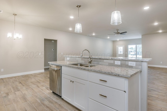 505 Pratt St, Claude, TX 79019 - kitchen with dishwasher, recessed lighting, a sink, light wood-style floors, and ceiling fan with notable chandelier