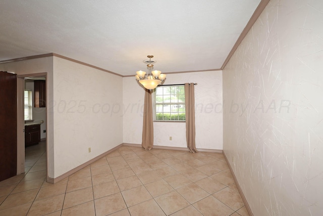 5507 Harvard St, Amarillo, TX 79109 - spare room with crown molding, a chandelier, baseboards, and light tile patterned flooring