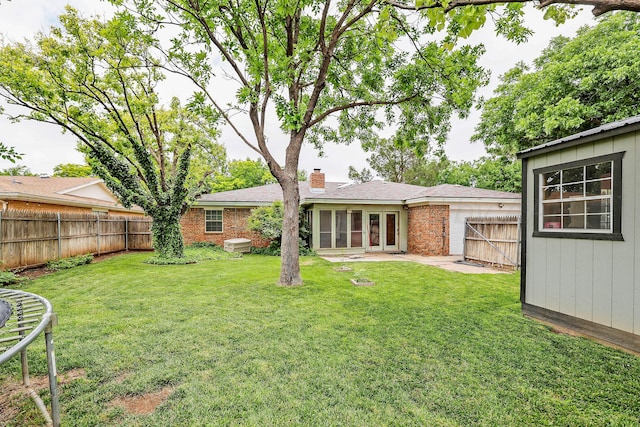5507 Harvard St, Amarillo, TX 79109 - view of yard featuring french doors and a patio area