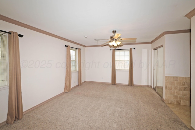 5507 Harvard St, Amarillo, TX 79109 - empty room featuring a ceiling fan, healthy amount of natural light, crown molding, light colored carpet, and baseboards