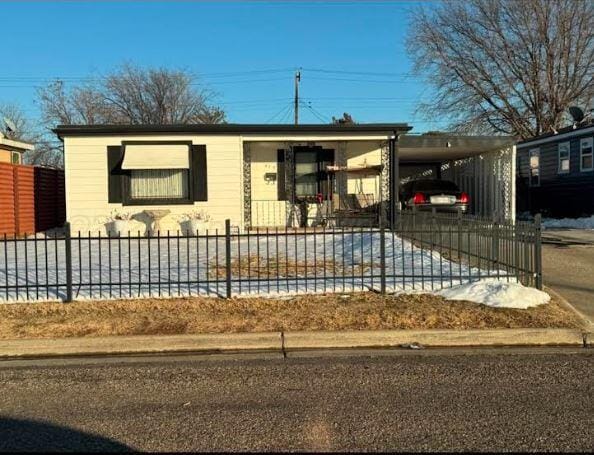 view of front of home with a carport