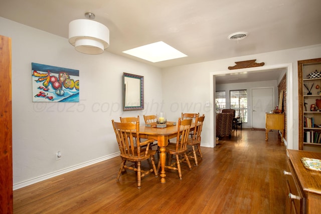 3412 Lenwood Dr, Amarillo, TX 79109 - dining space featuring a skylight and wood finished floors