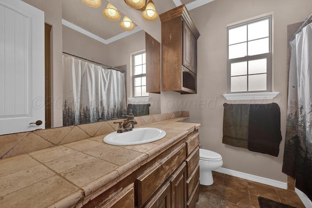 8313 Irvington Ct, Amarillo, TX 79119 - bathroom featuring ornamental molding, baseboards, toilet, vanity, and curtained shower