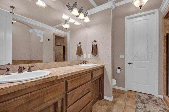 8313 Irvington Ct, Amarillo, TX 79119 - full bath with a shower stall, ornamental molding, toilet, double vanity, and tile patterned floors