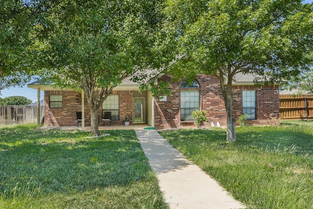 view of front facade with a front yard