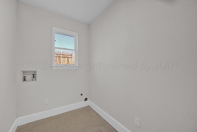 4204 Roxton Dr, Amarillo, TX 79109 - laundry room with baseboards and washer hookup