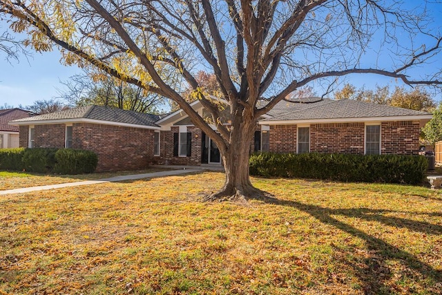4204 Roxton Dr, Amarillo, TX 79109 - single story home with brick siding and a front lawn