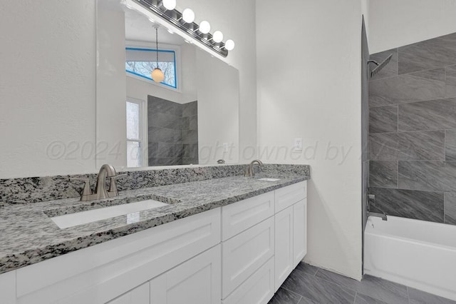 4204 Roxton Dr, Amarillo, TX 79109 - bathroom with double vanity and tub / shower combination