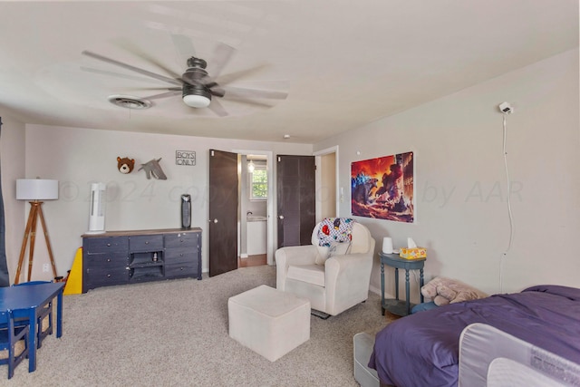 carpeted living room featuring ceiling fan