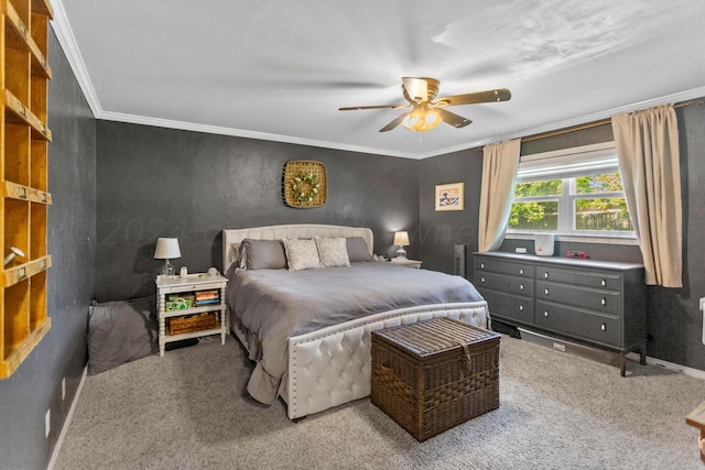 bedroom with ceiling fan, ornamental molding, and carpet