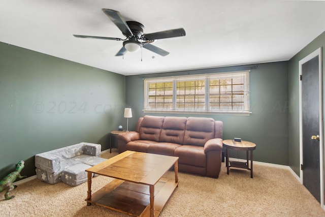 living room with light carpet and ceiling fan