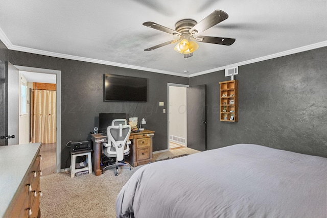 carpeted bedroom with ceiling fan and crown molding