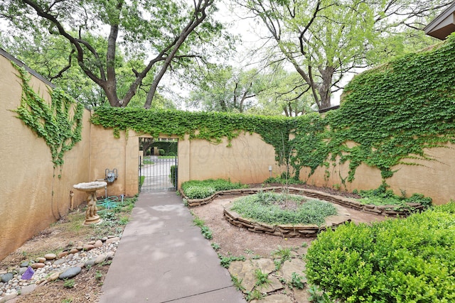 6 Woodstone St, Amarillo, TX 79106 - view of yard featuring a gate