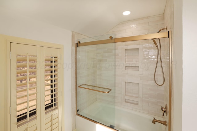 bathroom featuring enclosed tub / shower combo