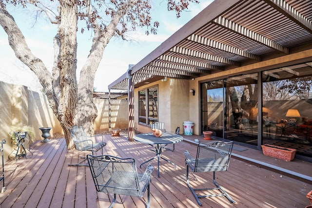 wooden terrace with a pergola