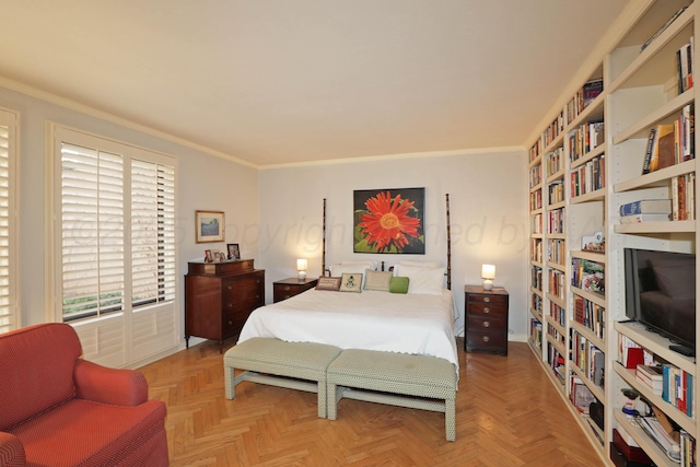 bedroom featuring ornamental molding and parquet floors