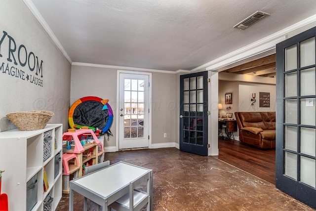 game room with a textured ceiling, visible vents, baseboards, french doors, and crown molding