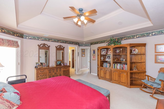 13841 Tangle Aire Pt, Amarillo, TX 79118 - carpeted bedroom with a raised ceiling, ornamental molding, and a ceiling fan