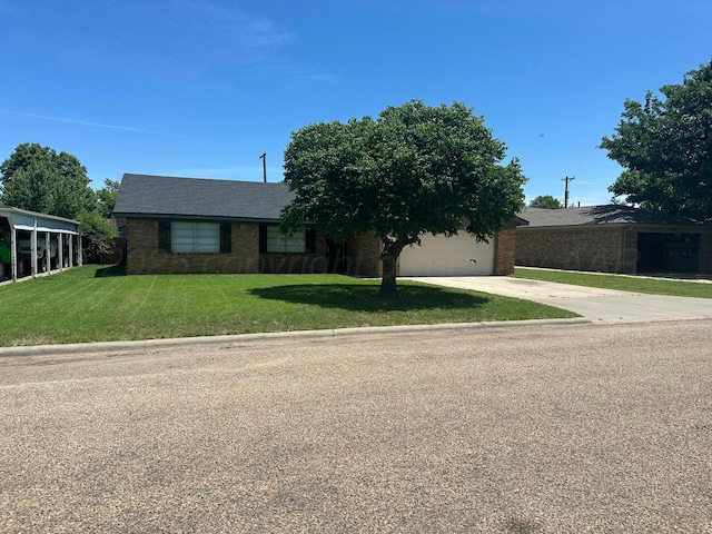313 Mustang St, Fritch, TX 79036 - view of front of property with driveway, a front lawn, and an attached garage