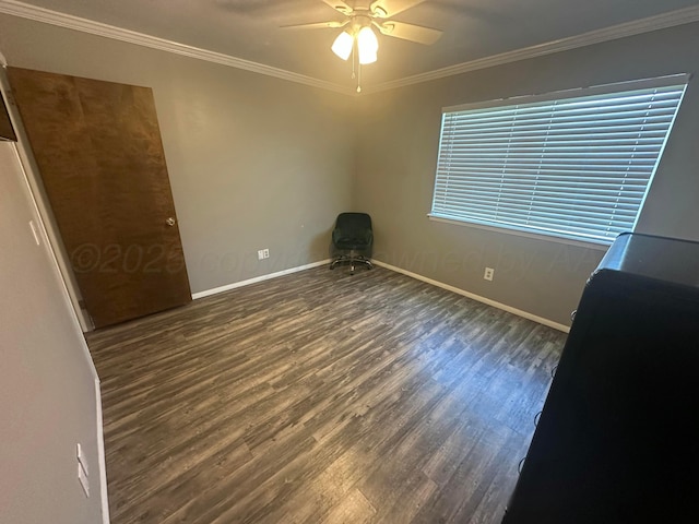 313 Mustang St, Fritch, TX 79036 - spare room with wood finished floors, crown molding, and ceiling fan