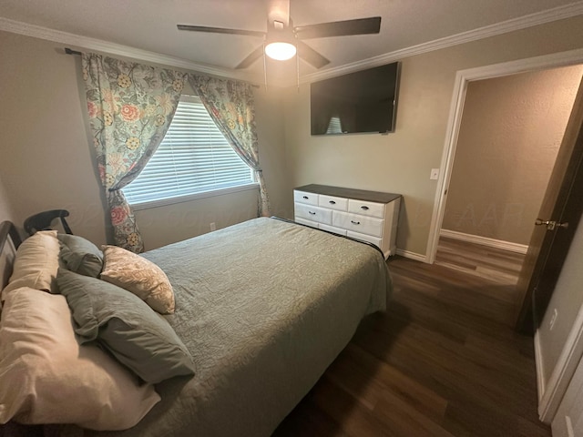 313 Mustang St, Fritch, TX 79036 - bedroom featuring dark wood finished floors, crown molding, and a ceiling fan